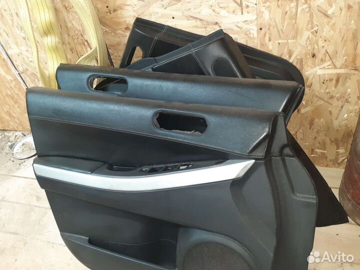 Обшивки двери мазда сх 7