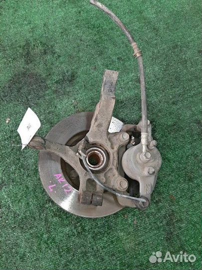 Кулак поворотный левый Nissan March