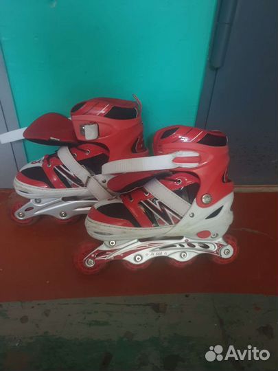 Роликовые коньки