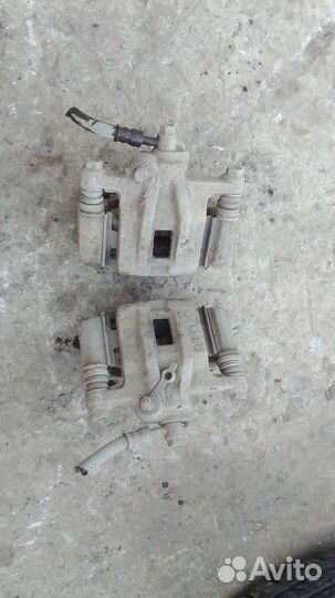 Суппорт задний Шевроле Лачетти