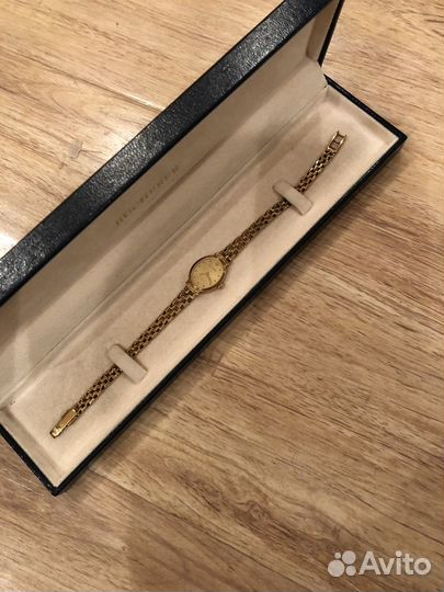 Золотые часы Bucherer