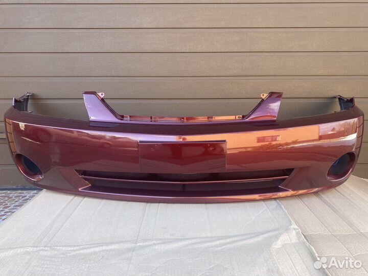 Бампер передний Kia Spectra