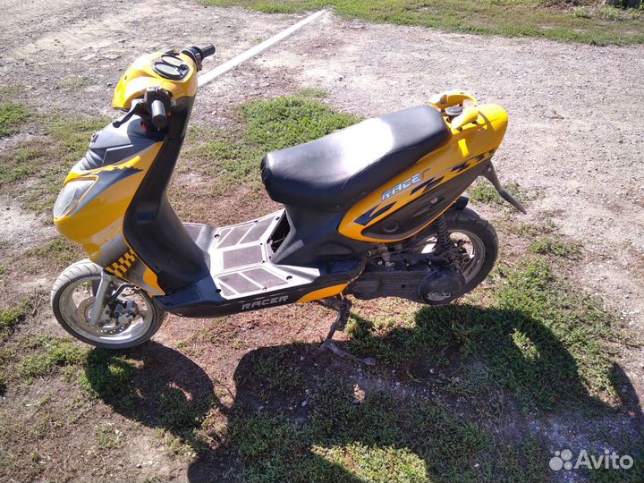Скутер рэйсер 125