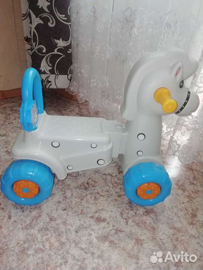 Детская лошадка на колесиках
