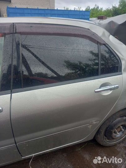 Дверь задняя левая Mitsubishi Lanser 9