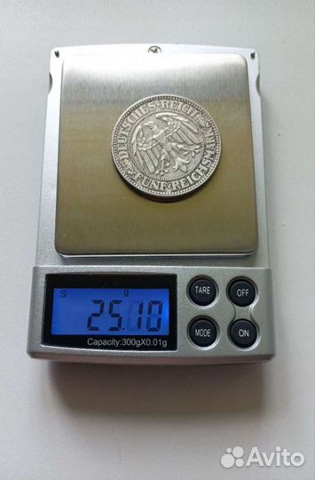 Монета серебряная