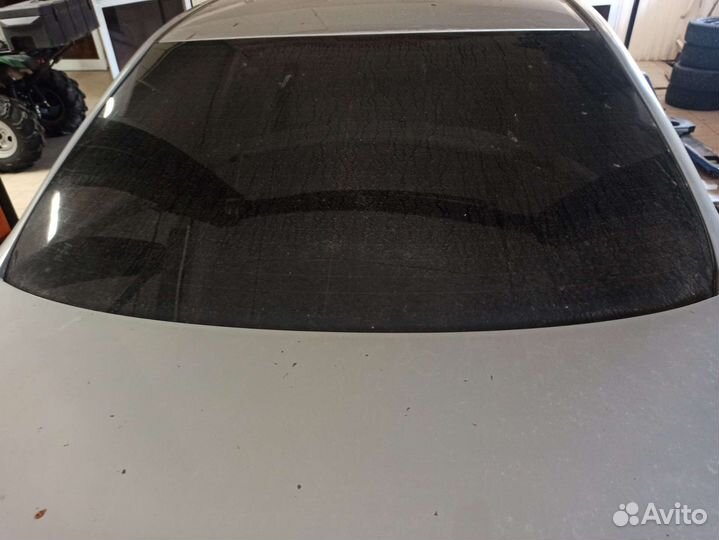 Стекло заднее Toyota Corolla E150