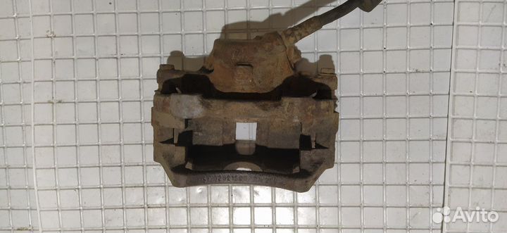 Суппорт тормозной передний левый Audi 80