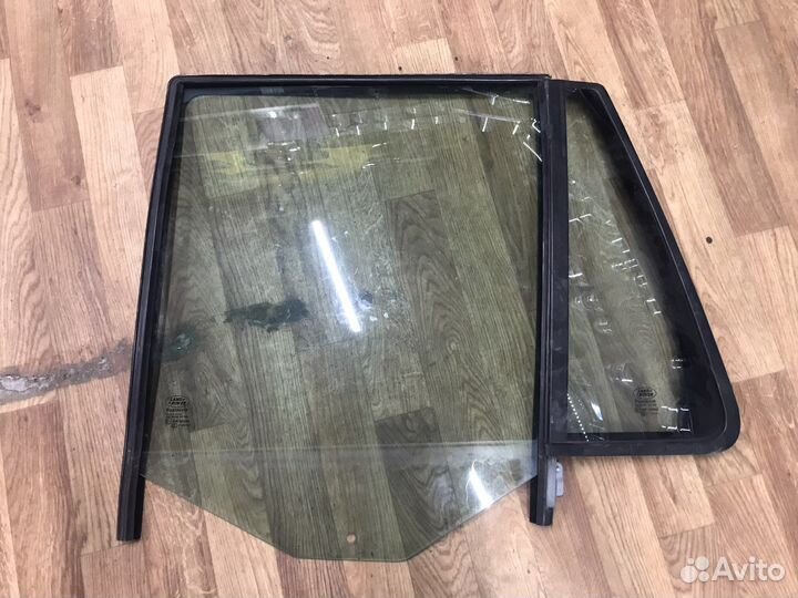 Стекло двери заднее левое Land Rover Freelander