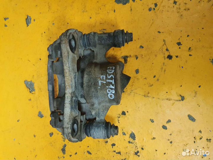 Суппорт тормозной передний левый toyota