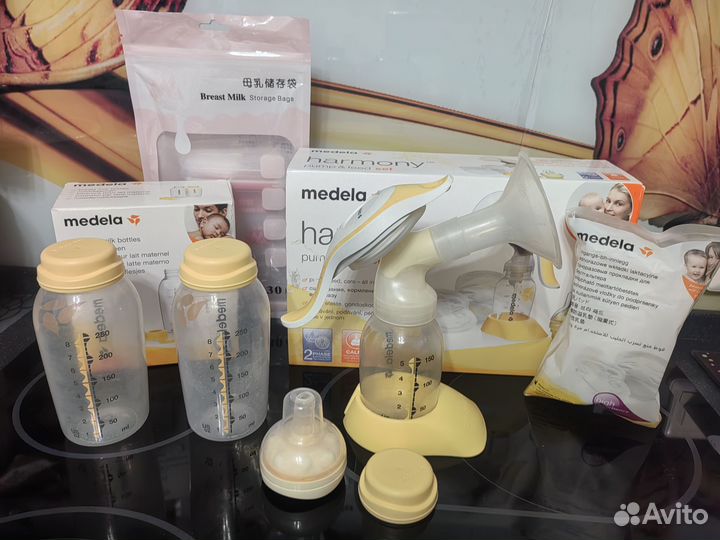 Молокоотсос ручной Medela, бутылочки, соска calma