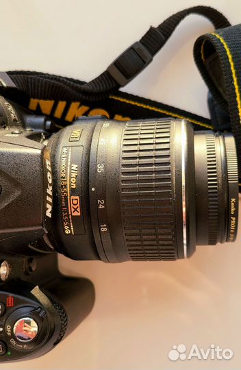 Зеркальный фотоаппарат Nikon D90 с объективом