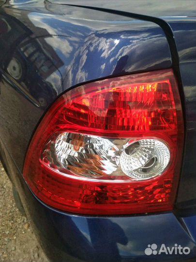 Фонарь левый Лада Приора седан