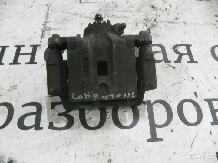 Суппорт тормозной задний левый Kia Sorento