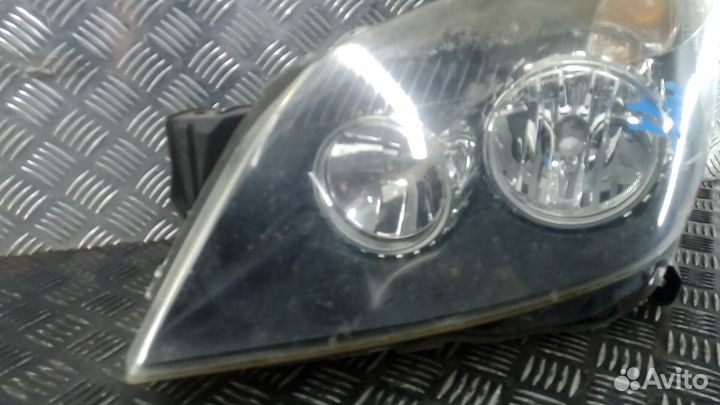 Фара левая Opel Astra H/Astra Family H