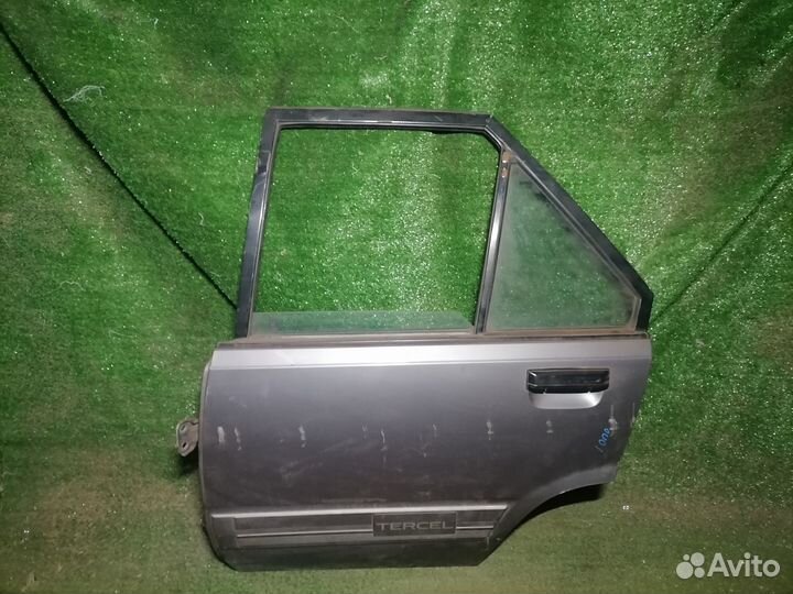 Дверь задняя левая Toyota Tercel AL20 Пустая