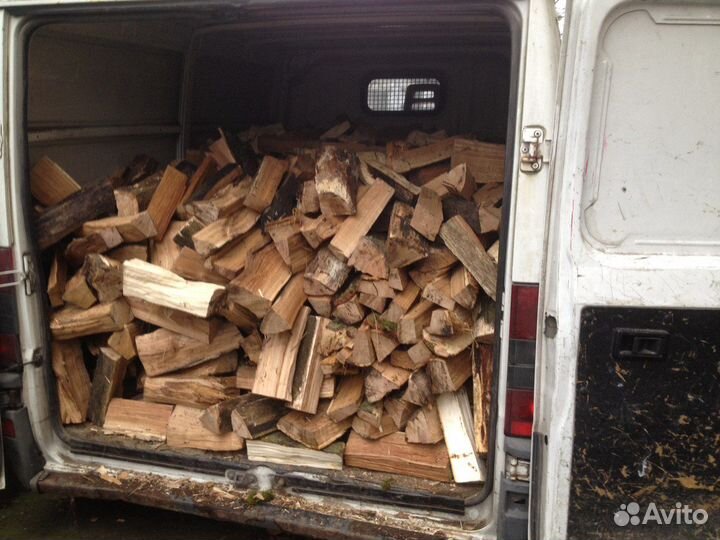 Дрова колотые в мешках