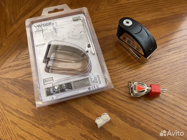 Замок на диск мотоцикла с сигнализацией