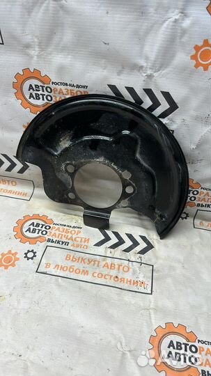 Пыльник тормозного диска перед Nissan Tiida c11