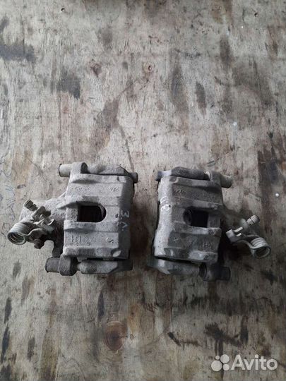 Суппорт задний Мазда 3 BL, BK