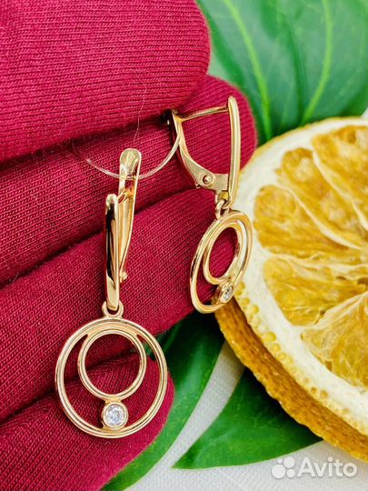 Золотые серьги висячие круг оригинальные
