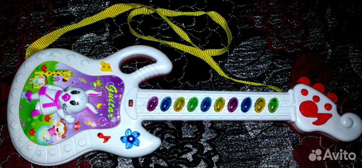 Детская музыкальная гитара на батарейках