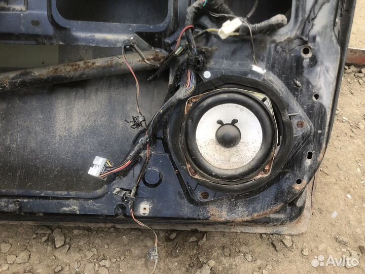 Дверь передняя левая Geely Emgrand EC7