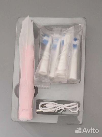 Электрическая ультразвуковая зубная щетка новая