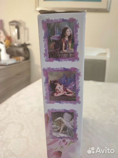 Кукла фарфоровая