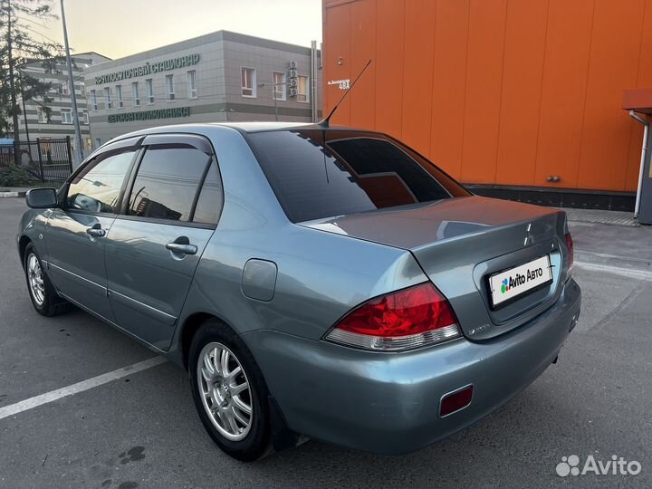 Mitsubishi Lancer 1.6 МТ, 2006, 260 000 км