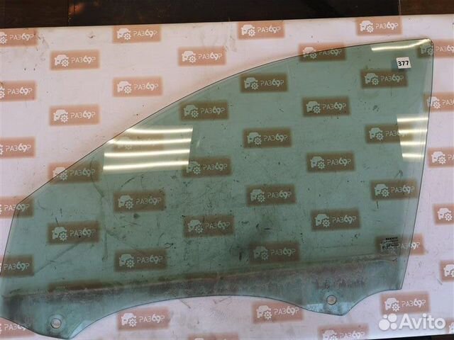 Стекло двери переднее левое Renault Laguna X74