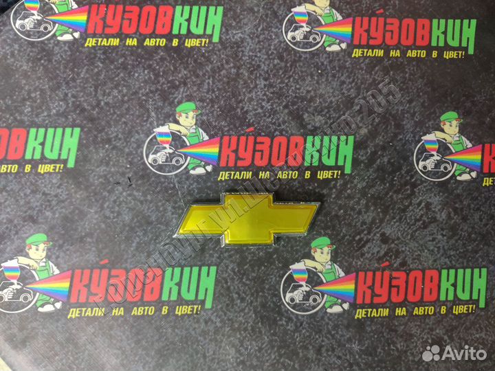 Эмблема chevrolet задняя 13*5 см новая шевроле