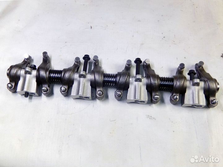 5340.1007090-01 ось с коромыслами и стойками