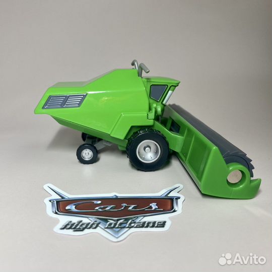 Зеленый комбайн Фрэнк из мульта Тачки