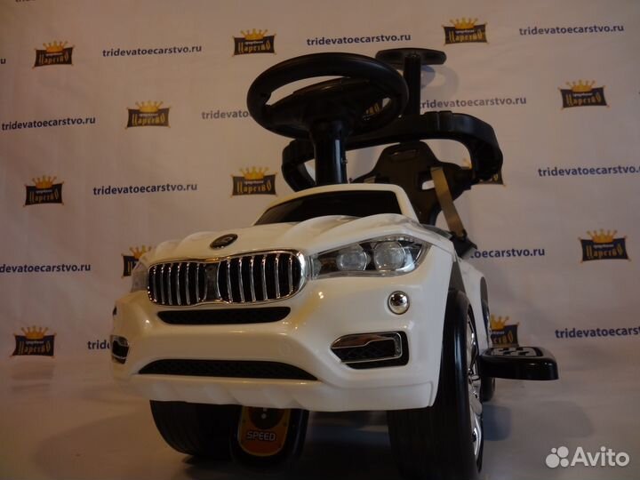 Детская машинка каталка с ручкой BMW - Толокар