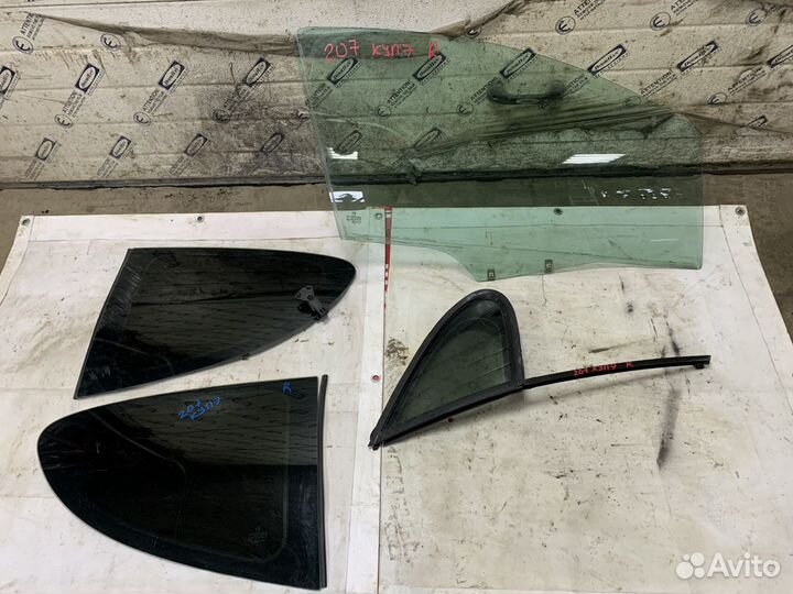 Стекло двери Peugeot 207