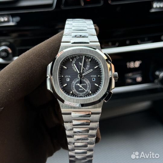 Часы Patek Philippe Nautilus Travel Time