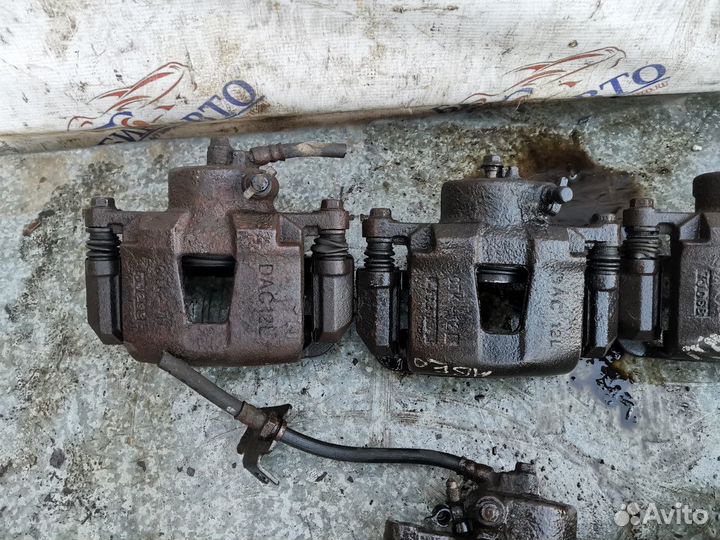 Суппорт тормозной передний левый Chevrolet Lacetti