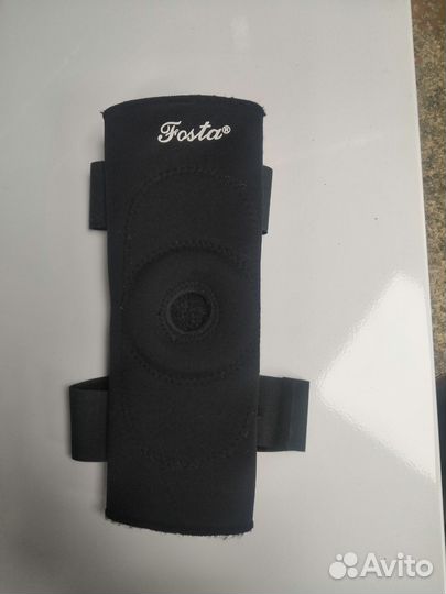 Фиксатор колена с пластинами