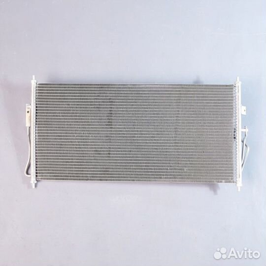 Радиатор кондиционера Ниссан Альмера В10 06-12