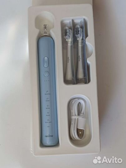 Электрическая зубная щетка