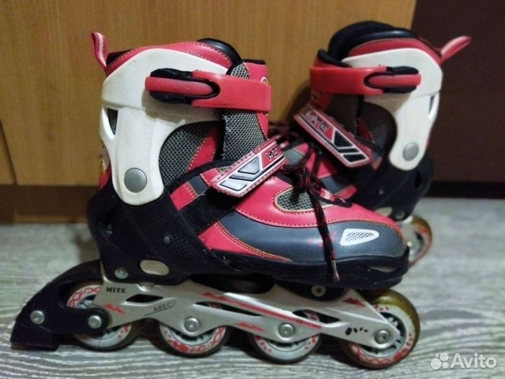 Роликовые коньки