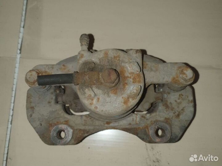 Суппорт тормозной передний Mitsubishi Airtrek cu2w