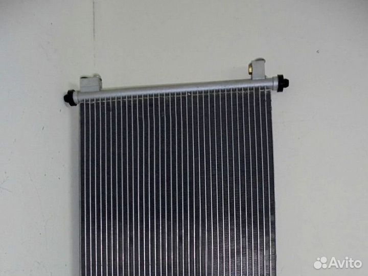 Радиатор кондиционера Ниссан Тиида 2004-2014