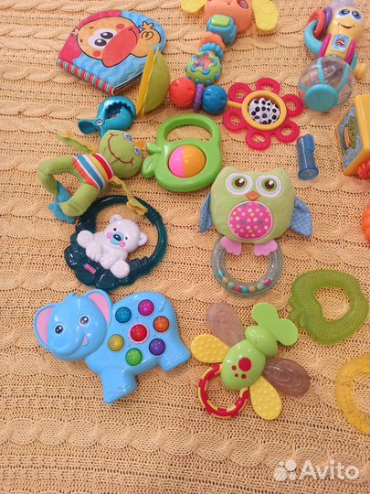Погремушки прорезыватели музыкальные игрушки