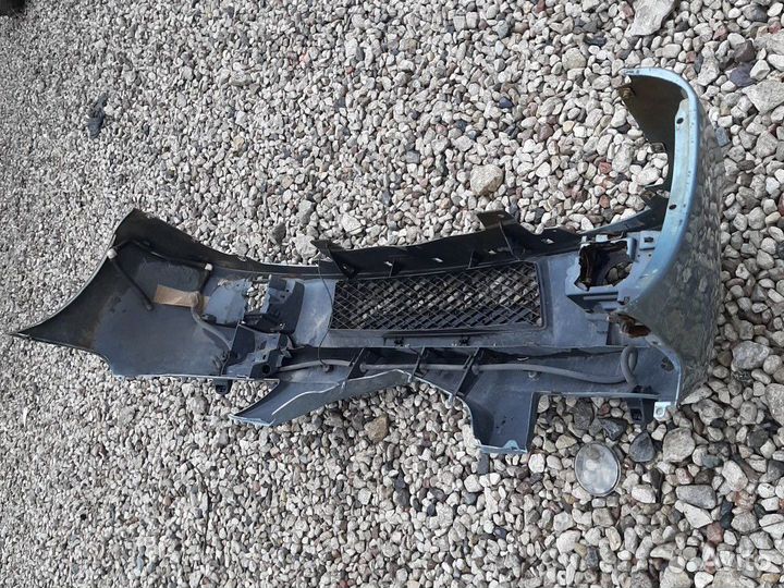 Бампер передний Мазда Примаси CP 2001-2004