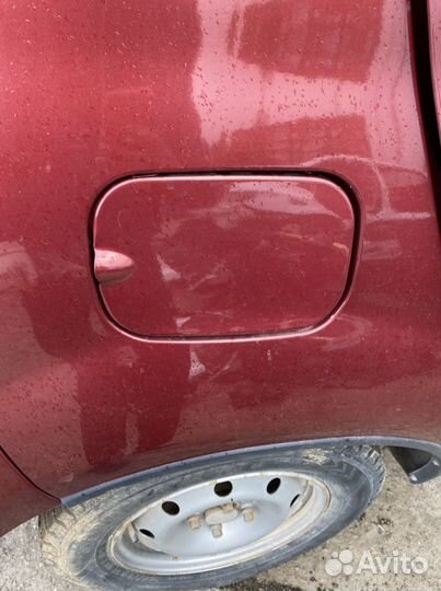 Лючок бензобака Renault Sandero 1