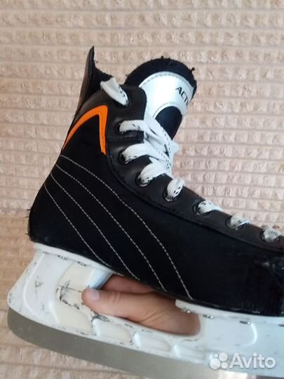 Коньки хоккейные action