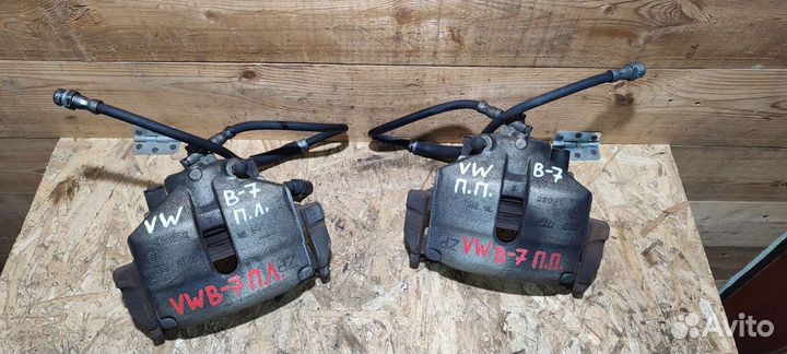 Суппорт передний Volkswagen Passat B7