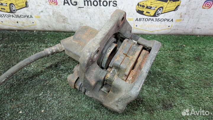 Суппорт тормозной передний левый Logan 1